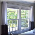 D06. Gray and white curtains. 